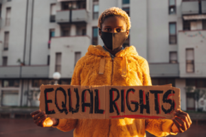 Women holding an Equal Rights sign